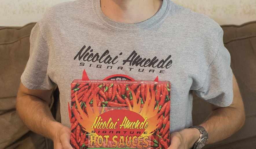 Nicolai Amende started Nicolai Amende Signature Hot Sauces seven years ago. His hot sauces can be found at Hilltop Meat Market, Wooden Spoon, Blue Sky Mercantile, Welsh Heritage Farms, Cheese and Pie Mongers in St. Peter and the Yellow Barn. (Jackson Forderer/The Free Press via AP)