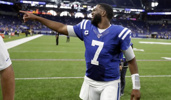 Indianapolis Colts quarterback Jacoby Brissett points to fans following an NFL football game against the Atlanta Falcons, Sunday, Sept. 22, 2019, in Indianapolis. Indianapolis won 27-24. (AP Photo/Michael Conroy)