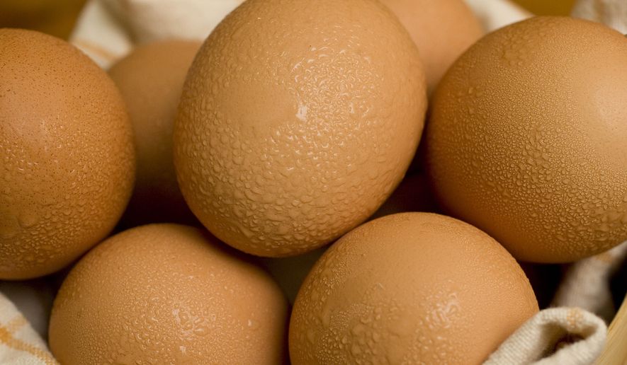 FILE - This 2008 file photo shows a bunch of boiled eggs in a bowl. For easy to peel eggs, place eggs into a heavy-duty 4-quart pot with cold water. Bring the water to a boil and cover the pot. Turn the heat off and let sit in the hot water for 30 minutes to 1 hour. Crack the bottom of each egg and slip the eggshell off. Rinse in the hot water to remove any small shell fragments. (AP Photo/Larry Crowe)