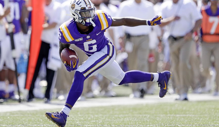 LSU wide receiver Terrace Marshall Jr. carries the ball against Vanderbilt in the first half of an NCAA college football game Saturday, Sept. 21, 2019, in Nashville, Tenn. (AP Photo/Mark Humphrey)