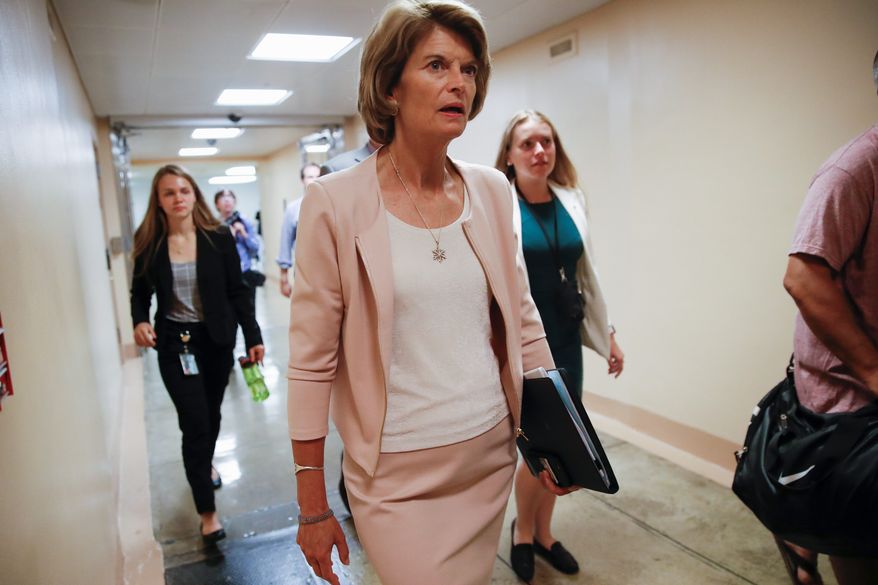 &quot;There is a line here that I believe has been overstepped,&quot; Sen. Lisa Murkowski, Alaska Republican, said about rebuking President Trump and the national emergency funds. (Associated Press)