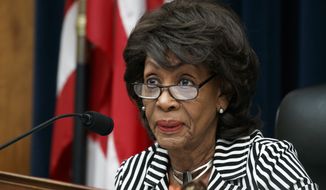 House Financial Services Committee Chair Rep. Maxine Waters, D-Calif., asks a question of Securities and Exchange Commission (SEC) Chairman Jay Clayton, during a committee hearing, Tuesday Sept. 24, 2019, on Capitol Hill in Washington. (AP Photo/Jacquelyn Martin)  ** FILE **