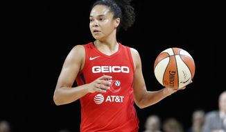 Washington Mystics&#39; Kristi Toliver (20) plays against the Las Vegas Aces during the second half of Game 4 of a WNBA playoff basketball series Tuesday, Sept. 24, 2019, in Las Vegas. (AP Photo/John Locher) ** FILE **