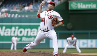 Washington Nationals relief pitcher Daniel Hudson throws to the Philadelphia Phillies in the ninth inning of the first baseball game of a doubleheader, Tuesday, Sept. 24, 2019, in Washington. (AP Photo/Patrick Semansky) ** FILE **