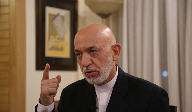 Former President Hamid Karzai speaks during an interview in Kabul, Afghanistan, Tuesday, Sept. 24, 2019. (AP Photo/Rahmat Gul)