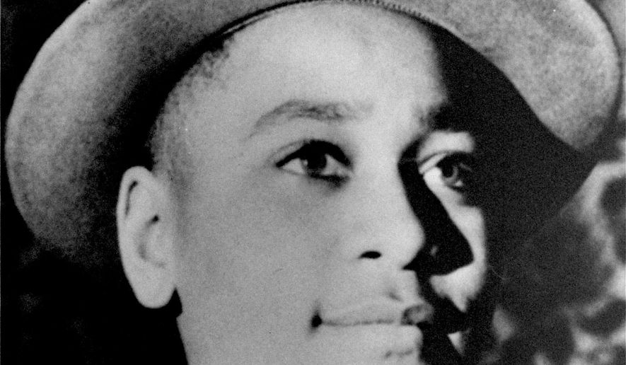 This undated portrait shows Emmett Till. The government is still investigating the brutal slaying of the black teenager that helped spur the civil rights movement more than 60 years ago. A Justice Department report issued to Congress about civil rights cold case investigations lists the 1955 slaying of 14-year-old Till as being among the unit’s active cases. Till, who was from Chicago, was abducted and beaten to death hours after he whistled at a white woman while visiting Mississippi. His body was found in a river days later. (AP Photo/File) **FILE**
