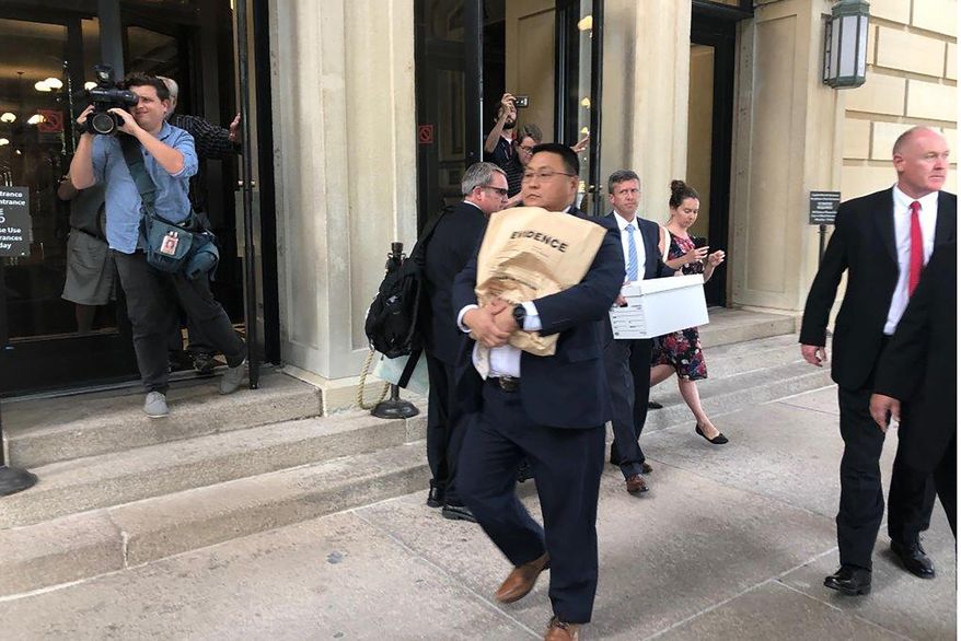 An unidentified man carries a box marked &amp;quot;evidence&amp;quot; as he leaves  the Illinois State Capital in Springfield Ill., Tuesday, Sept. 24, 2019.  An FBI spokesman says agents are at the Illinois state Capitol building in Springfield related to law enforcement work. The spokesman, John Althen, wouldn&#x27;t provide details, saying Tuesday only that &amp;quot;FBI personnel are present at the state capitol engaged in authorized law enforcement activity.&amp;quot; (AP Photo by John O&#x27;Connor)