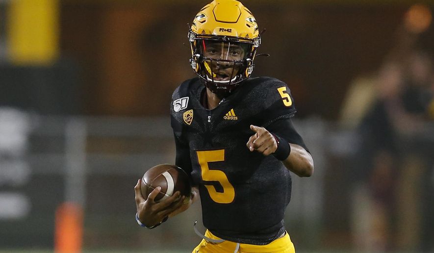 Arizona State quarterback Jayden Daniels runs for a first down against Colorado during the first half of an NCAA college football game Saturday, Sept. 21, 2019, in Tempe, Ariz. (AP Photo/Rick Scuteri)
