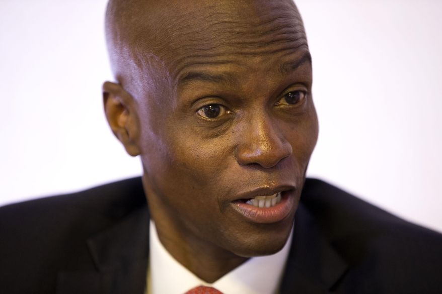 FILE - In this Aug. 28, 2019 file photo, Haiti's President Jovenel Moise speaks during an interview in his office in Port-au-Prince, Haiti. Moise is urging a pause in protests that have paralyzed the Caribbean nation. The Haitian leader appealed for calm and unity in a televised speech early Wednesday, Sept. 25, 2019, as he asked opponents to help his administration resolve the multiple problems Haiti is facing. (AP Photo/Dieu Nalio Chery, File)
