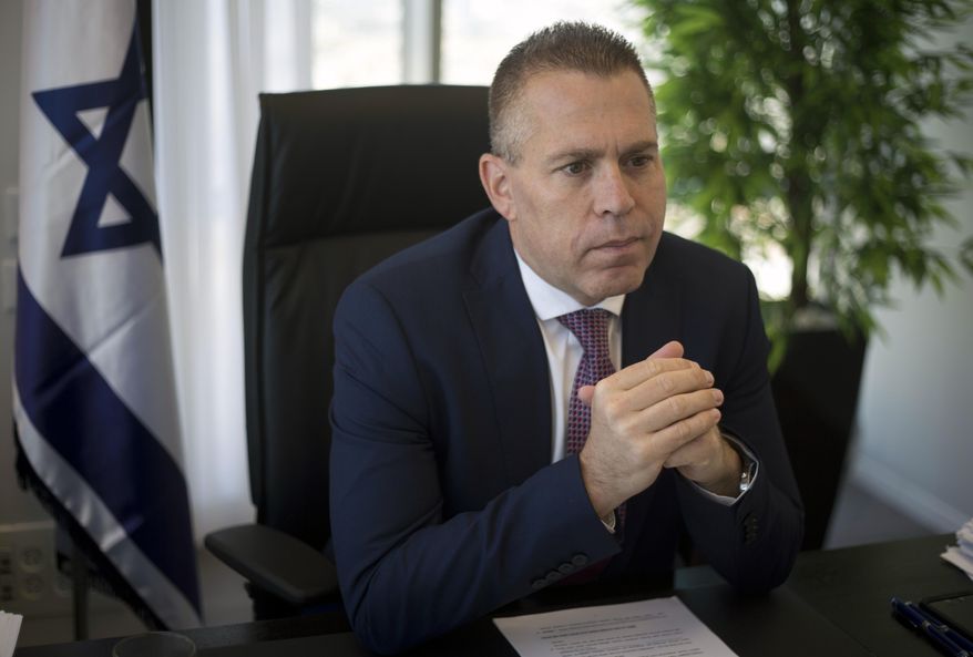 FILE - In this file photo dated Thursday, Oct. 26, 2017, Israeli Public Security Minister Gilad Erdan speaks during an interview with The Associated Press in his office in Bnei Brak, east Tel Aviv. Erdan, the Israeli minister of strategic affairs, during a news conference in Brussels on Wednesday Sept. 25, 2019, urged European Union leaders to take action against organizations supporting an international boycott of Israel over its treatment of the Palestinians.(AP Photo/Ariel Schalit, FILE)