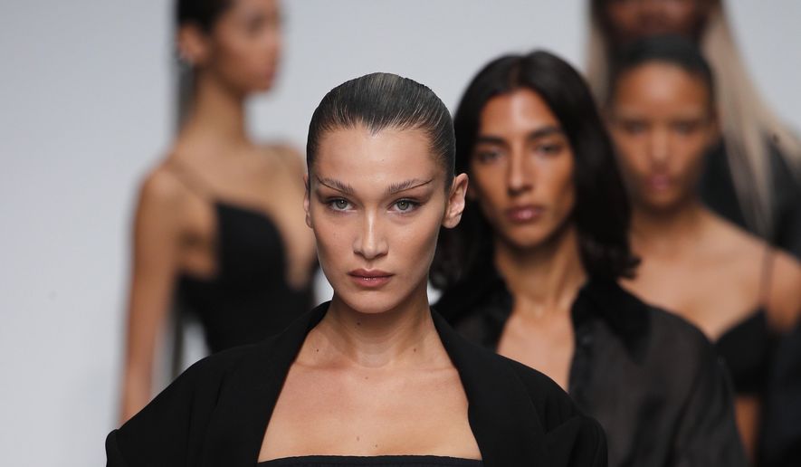 Model Bella Hadid wears a creation as part of the Mugler Ready To Wear Spring-Summer 2020 collection, unveiled during the fashion week, in Paris, Wednesday, Sept. 25, 2019. (AP Photo/Francois Mori)