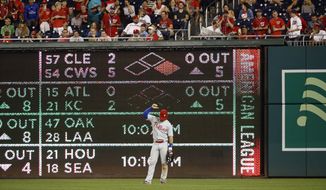 Philadelphia Phillies right fielder Bryce Harper gestures to spectators in the stands during the eighth inning of the team&#39;s baseball game against the Washington Nationals, Wednesday, Sept. 25, 2019, in Washington. (AP Photo/Patrick Semansky) ** FILE **