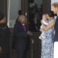 Britain&#39;s Prince Harry and Meghan, Duchess of Sussex, holding their son Archie, meet with Anglican Archbishop Emeritus, Desmond Tutu, and his wife Leah in Cape Town, South Africa, Wednesday, Sept. 25, 2019. The royal couple are on the third day of their African tour. (Henk Kruger/African News Agency via AP, Pool)