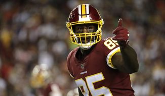 Washington Redskins tight end Vernon Davis gestures toward a line judge during the first half of an NFL football game against the Chicago Bears Monday, Sept. 23, 2019, in Landover, Md. (AP Photo/Julio Cortez) **FILE**