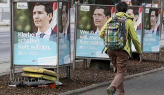 A person passes and election poster of the conservative Austrian People&#39;s Party, OEVP, with a portrait of former Austrian chancellor Sebastian Kurz, for the upcoming Austrian national elections in Vienna, Austria, Monday, Sept. 23, 2019. The Austrian elections will held on Sunday, Sept. 29, 2019. The poster reads: &#39; Create clarity vote for Kurz. Austria needs his Chancellor&#39;. (AP Photo/Ronald Zak)