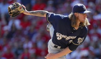 Milwaukee Brewers relief pitcher Josh Hader throws in the ninth inning of a baseball game against the Cincinnati Reds, Thursday, Sept. 26, 2019, in Cincinnati. (AP Photo/John Minchillo)