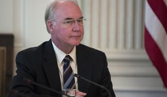 File-This Sept. 28, 2019, file photo shows then Secretary of Health and Human Services Tom Price attending an opioid roundtable discussion at the White House in Washington. Price is seeking a return ticket to Washington nearly two years after being ousted for excessive travel spending. He submitted an application to Georgia’s Republican Gov. Brian Kemp seeking appointment to the U.S. Senate, Kemp spokesman Cody Hall confirmed Thursday, Sept. 26, 2019. (AP Photo/Carolyn Kaster, File)
