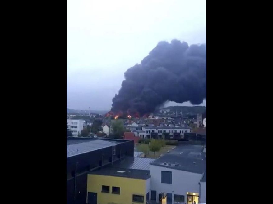 This image taken from video the Twitter account @JulietteChrl shows black smoke rising from a fire at a chemical plant in Rouen, Thursday Sept. 26, 2019. An immense mass of black smoke is rising over Normandy as firefighters battle a blaze Thursday at a chemical plant, and authorities closed schools in 11 surrounding towns and asked residents to stay indoors. No injuries have been reported. (@JulietteChrl Twitter account via AP)