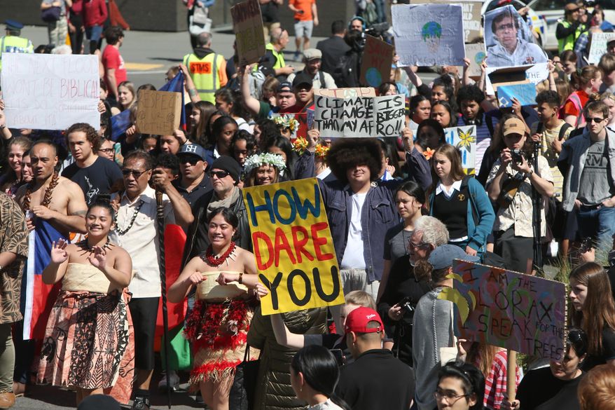 Thousands of people march on Parliament to protest climate change in Wellington, New Zealand, Friday, Sept. 27, 2019. The protest in New Zealand was part of a second wave of protests around the world as the United Nations General Assembly met in New York. (AP Photo/Nick Perry) ** FILE **
