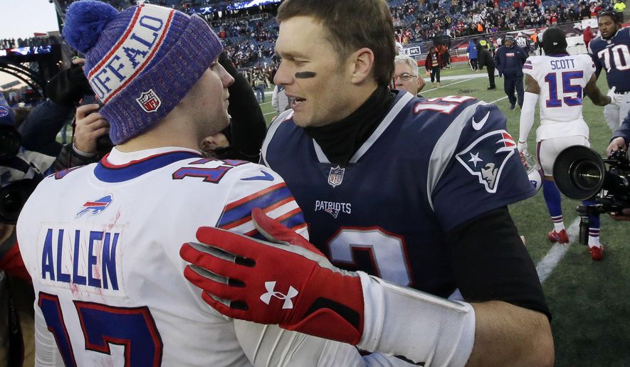 FILE - In this Dec. 23, 2018, file photo, Buffalo Bills quarterback Josh Allen, left, and New England Patriots quarterback Tom Brady speak at midfield after an NFL football game in Foxborough, Mass. The Buffalo Bills brace for Tom Brady and the Patriots to make their annual visit to town in what&#39;s been an AFC East rivalry heavily weighted in New England&#39;s favor for the past 20 years. The new-look Bills hope this weekend might be different in a matchup of two 3-0 teams.(AP Photo/Steven Senne, File)
