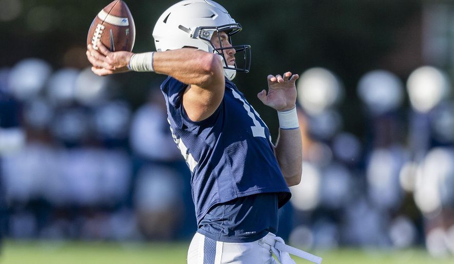 Penn State quarterback Sean Clifford throws during the NCAA college football team's practice Tuesday, Sept. 24, 2019, in State College, Pa. (Joe Hermitt/The Patriot-News via AP)