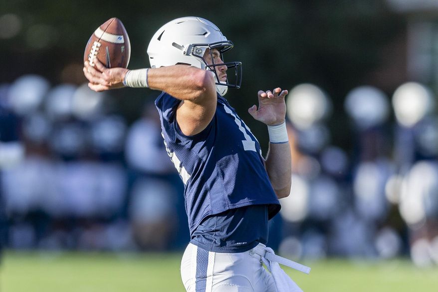 Penn State quarterback Sean Clifford throws during the NCAA college football team's practice Tuesday, Sept. 24, 2019, in State College, Pa. (Joe Hermitt/The Patriot-News via AP)
