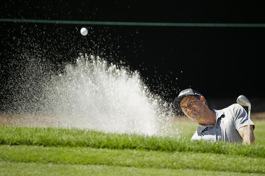Adam Scott, of Australia, follows his shot out of a bunker onto the seventh green of the Silverado Resort North Course during the first round of the Safeway Open PGA golf tournament Thursday, Sept. 26, 2019, in Napa, Calif. (AP Photo/Eric Risberg)