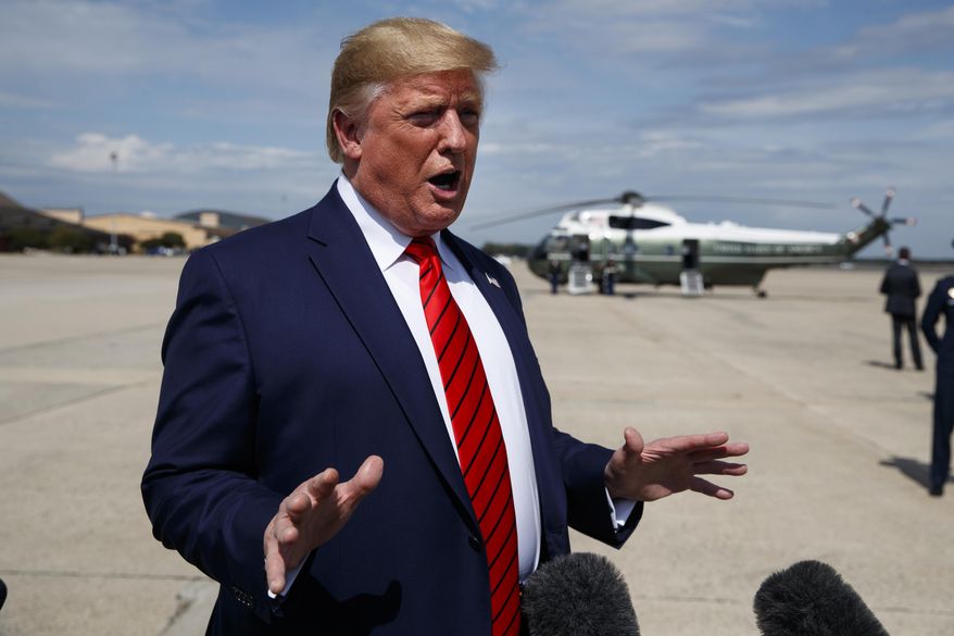President Donald Trump talks with reporters after arriving at Andrews Air Force Base, Thursday, Sept. 26, 2019, in Andrews Air Force Base, Md.Trump had spent the week attending the United Nations General Assembly in New York.  (AP Photo/Evan Vucci)(AP Photo/Evan Vucci)
