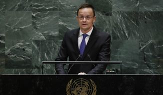 Hungarian Minister of Foreign Affairs and Trade Peter Szijjarto addresses the 74th session of the United Nations General Assembly, Thursday, Sept. 26, 2019, at the U.N. headquarters. (AP Photo/Frank Franklin II)  **FILE**