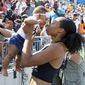 FILE - In this July 27, 2019, file photo, Allyson Felix holds her daughter Camryn after running the women&#39;s 400-meter dash final at the U.S. Championships athletics meet in Des Moines, Iowa. A rebellion led by some of the sport&#39;s top runners, Allyson Felix, Kara Goucher and Alysia Montano, is helping change that, and two months after the U.S. women&#39;s soccer players stated their case for equal pay, women in athletics are finding footing on an equally important crusade. &amp;quot;I feel like (my voice has been heard), and I feel like that only because of women coming together,&amp;quot; Felix said in an interview with The Associated Press. (AP Photo/Charlie Neibergall, File)