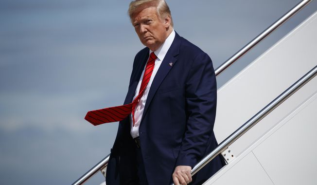 President Donald Trump steps off Air Force One after arriving at Andrews Air Force Base, Thursday, Sept. 26, 2019, in Andrews Air Force Base, Md.  Trump had spent the week attending the United Nations General Assembly in New York. (AP Photo/Evan Vucci)