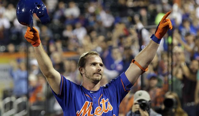 New York Mets&#x27; Pete Alonso takes a curtain call after hitting his 52nd home run of the season during the first inning of a baseball game against the Atlanta Braves, Friday, Sept. 27, 2019, in New York. (AP Photo/Adam Hunger)