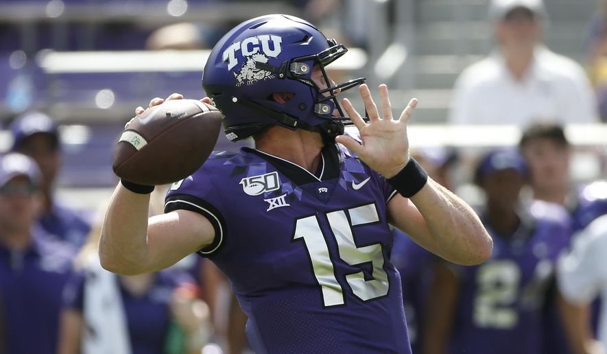 TCU quarterback Max Duggan (15) throws against SMU during the first half of an NCAA college football game Saturday, Sept. 21, 2019, in Fort Worth, Texas. (AP Photo/Ron Jenkins)