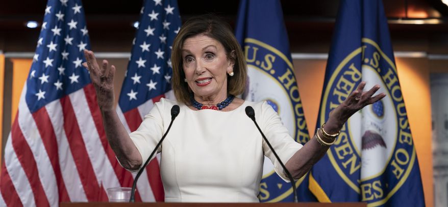 Speaker of the House Nancy Pelosi, D-Calif., addresses reporters at the Capitol in Washington, Thursday, Sept. 26, 2019, as Acting Director of National Intelligence Joseph Maguire appears before the House Intelligence Committee about a secret whistleblower complaint involving President Donald Trump. Pelosi committed Tuesday to launching a formal impeachment inquiry against Trump. (AP Photo/J. Scott Applewhite)