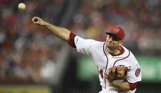 Washington Nationals relief pitcher Daniel Hudson (44) delivers a pitch during a baseball game against the Cleveland Indians, Saturday, Sept. 28, 2019, in Washington. The Nationals won 10-7. (AP Photo/Nick Wass)