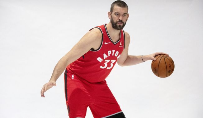 Toronto Raptors&#x27; Marc Gasol poses during a photo shoot at the Raptors Media day in Toronto, Saturday, Sept. 28, 2018. . (Chris Young/The Canadian Press via AP)