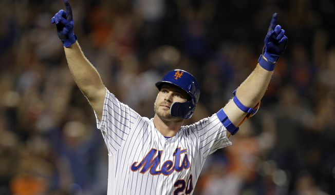 New York Mets&#x27; Pete Alonso reacts after hitting his 53rd home run of the season during the third inning of a baseball game against the Atlanta Braves, Saturday, Sept. 28, 2019, in New York. (AP Photo/Adam Hunger)