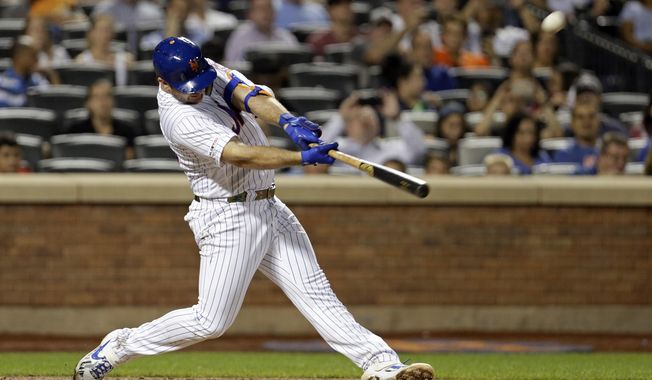 New York Mets&#x27; Pete Alonso hits his 53rd home run of the season during the third inning of a baseball game against the Atlanta Braves, Saturday, Sept. 28, 2019, in New York. (AP Photo/Adam Hunger)