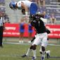 Kansas Jayhawks quarterback Carter Stanley (9) tries to leap over TCU Horned Frogs safety Trevon Moehrig (7) in the fourth quarter as the Kansas Jayhawks play the TCU Horned Frogs at Amon Carter Stadium in Fort Worth, Texas Saturday, Sept. 28, 2019.   (David Kent/Star-Telegram via AP)