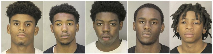 This combination of Sept. 27, 2019 photos provided by the Nassau County Police Department in Oceanside, N.Y., shows five teens arrested in connection with a fatal attack on a Long Island high school student during an after-school fight on Sept. 16, 2019. From left are: Marquis Stephens, Javonte Neals, Sean Merritt, Haakim Mechan, and Taj Woodruff. (Nassau County Police Department via AP)