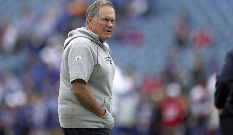 New England Patriots head coach Bill Belichick watches the team warm up before an NFL football game against the Buffalo Bills, Sunday, Sept. 29, 2019, in Orchard Park, N.Y. (AP Photo/Ron Schwane)