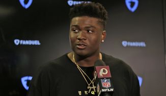 Washington Redskins quarterback Dwayne Haskins speaks to reporters after an NFL football game against the New York Giants, Sunday, Sept. 29, 2019, in East Rutherford, N.J. The Giants defeated the Redskins 24-3. (AP Photo/Adam Hunger)