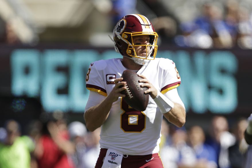 Washington Redskins quarterback Case Keenum looks to throw during the first half of an NFL football game against the New York Giants, Sunday, Sept. 29, 2019, in East Rutherford, N.J. (AP Photo/Adam Hunger)