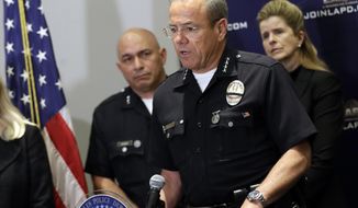 In this Aug. 6, 2019, file photo Los Angeles Police Department Chief Michel Moore talks during a news conference at LAPD headquarters in Los Angeles. The Los Angeles Police Department has launched an investigation after a recruitment ad went up on the right-wing website Breitbart, the Los Angeles Times reported. The department said such a job listing would conflict with its core values. Moore said Saturday, Sept. 28, 2019, on Twitter that the LAPD did not purchase ad space from the site and is trying to determine whether the posting was meant to tarnish the department&#39;s image. (AP Photo/Marcio Jose Sanchez, File)
