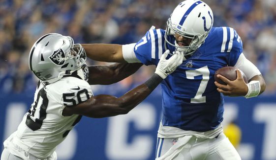Oakland Raiders linebacker Nicholas Morrow (50) tackles Indianapolis Colts quarterback Jacoby Brissett (7) during the second half of an NFL football game in Indianapolis, Sunday, Sept. 29, 2019. (AP Photo/AJ Mast)