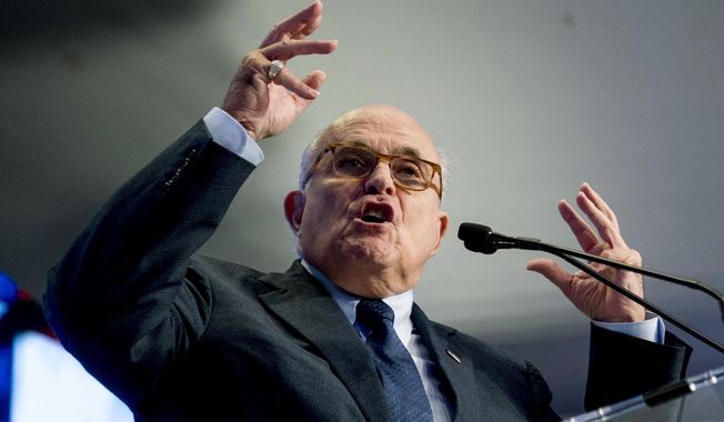 In this May 5, 2018, file photo, Rudy Giuliani, an attorney for President Donald Trump, speaks in Washington. Giuliani says he&#x27;d only cooperate with the House impeachment inquiry if his client agreed. (AP Photo/Andrew Harnik, File)