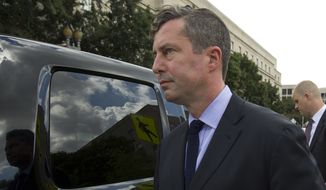 W. Samuel Patten leaves the federal court in Washington, Friday, Aug. 31, 2018. Patten entered a guilty plea in federal court in Washington, shortly after prosecutors released a four-page charging document that accused him of performing lobbying and consulting work in the United States and Ukraine but failing to register as a foreign agent as required by the Justice Department. (AP Photo/Jose Luis Magana)
