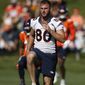 JAKE BUTT                                                                                                          
Denver Broncos tight end Jake Butt (80) takes part in drills during an NFL football training camp session Tuesday, Aug. 6, 2019, in Englewood, Colo. (AP Photo/David Zalubowski)
