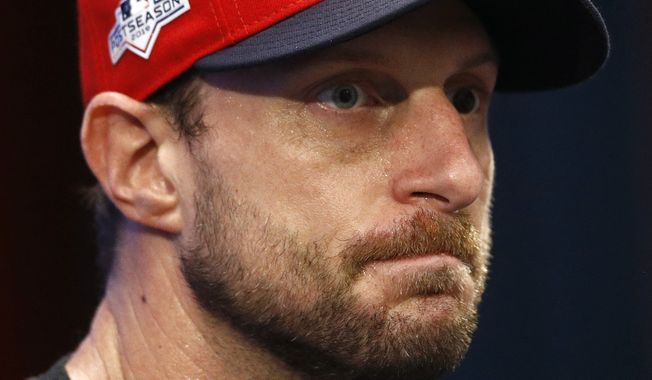 Washington Nationals starting pitcher Max Scherzer speaks at a baseball news conference, Monday, Sept. 30, 2019, in Washington. The Nationals are scheduled to face the Milwaukee Brewers in a National League wild card game Tuesday, Oct. 1. (AP Photo/Patrick Semansky)