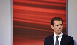 Top candidate of the Austrian People&#39;s Party, OEVP, Sebastian Kurz arrives for a TV interview in Vienna, Austria, Sunday, Sept. 29, 2019, after the closing of the polling stations for the Austrian national elections. (AP Photo/Matthias Schrader)